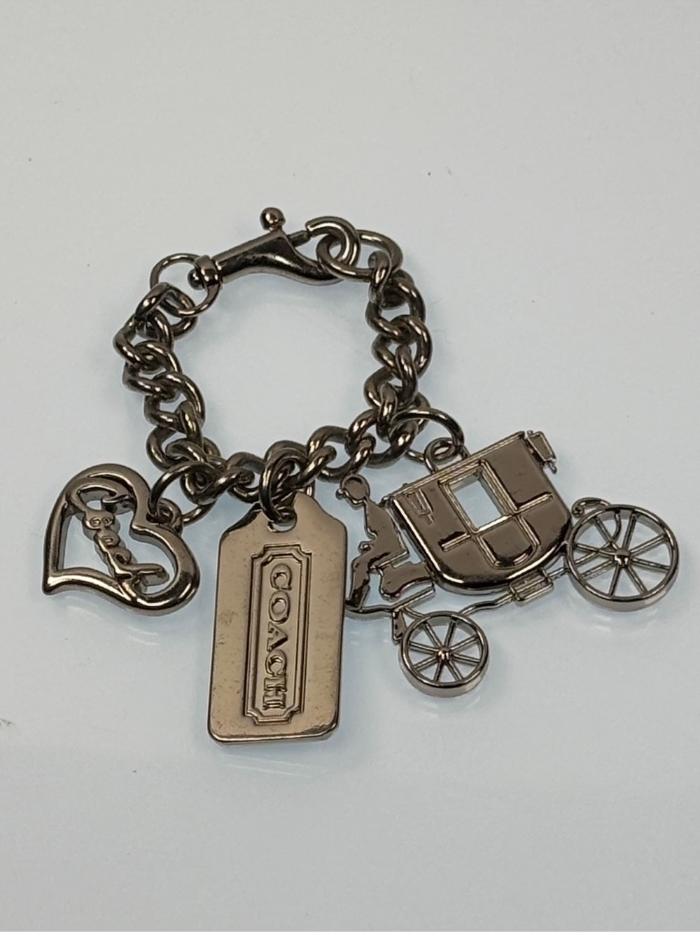 COACH Silver-Tone bag Charm Keychain with Coach Tag and Carriage logo Charms